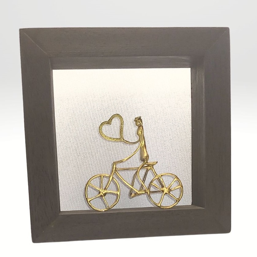 Bronze sculpture in frame 