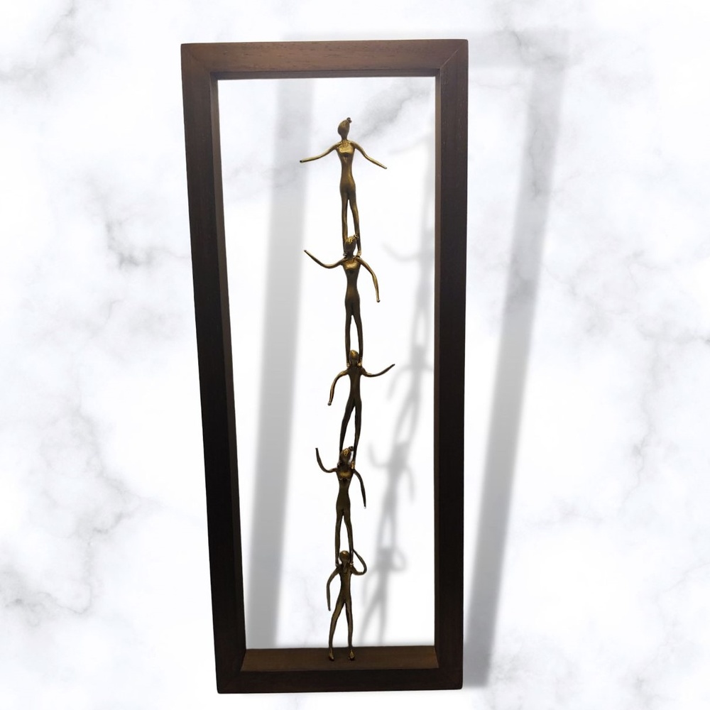 Bronze sculpture in frame 