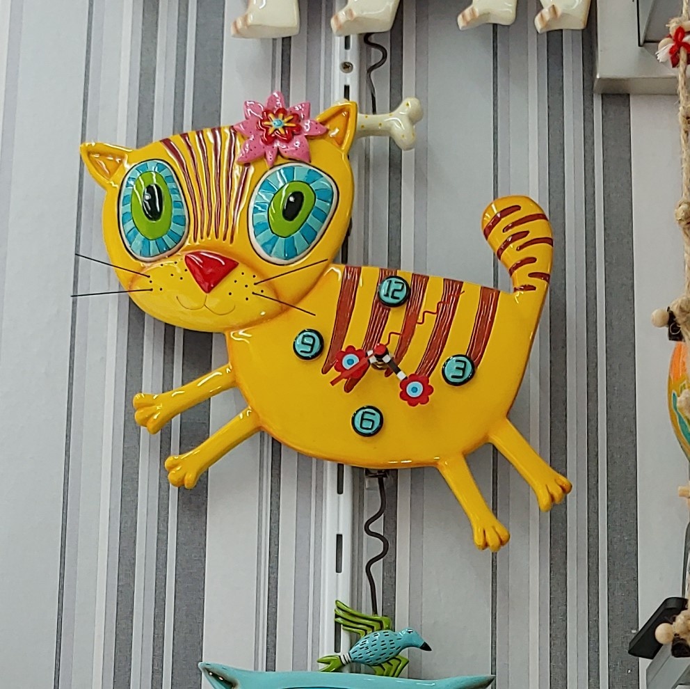Clock cat with bow. Pendular 131 - Punctual items 