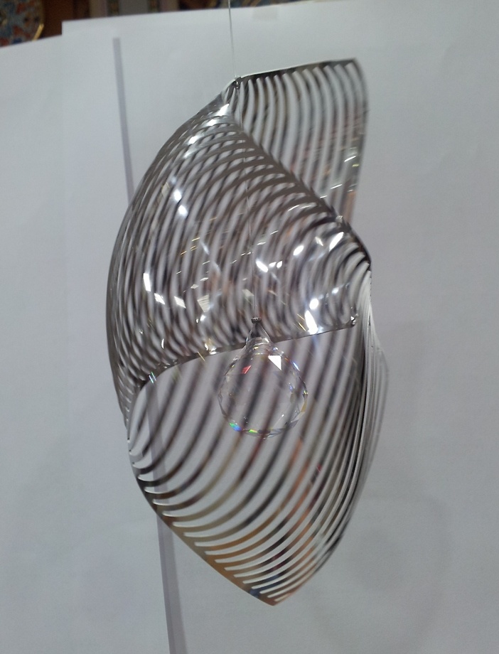 Shell spiral with glass ball 