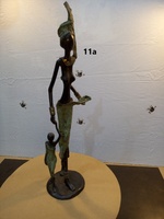 African Bronzes - "Woman with child and without blouse"