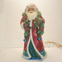 "Santa Claus with Garland and Poinsettia", Jim Shore - Christmas Collection