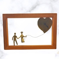 Sonata Galerie - Skulptur "Ethereal Love" Frame mit Uhr