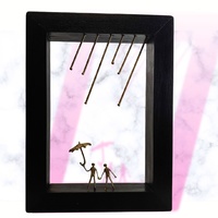 Sonata Gallery - "Boys". Bronze figures scene on wood frame.