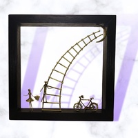 Sonata Gallery - "Staircase to the sky". Bronze figures scene on wood frame.